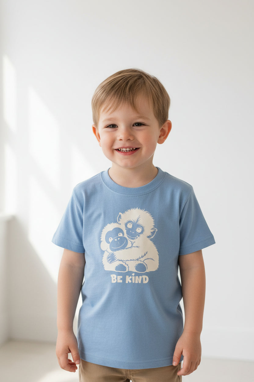 kids short sleeve tshirt with punch the monkey design in white htv with be kind logo