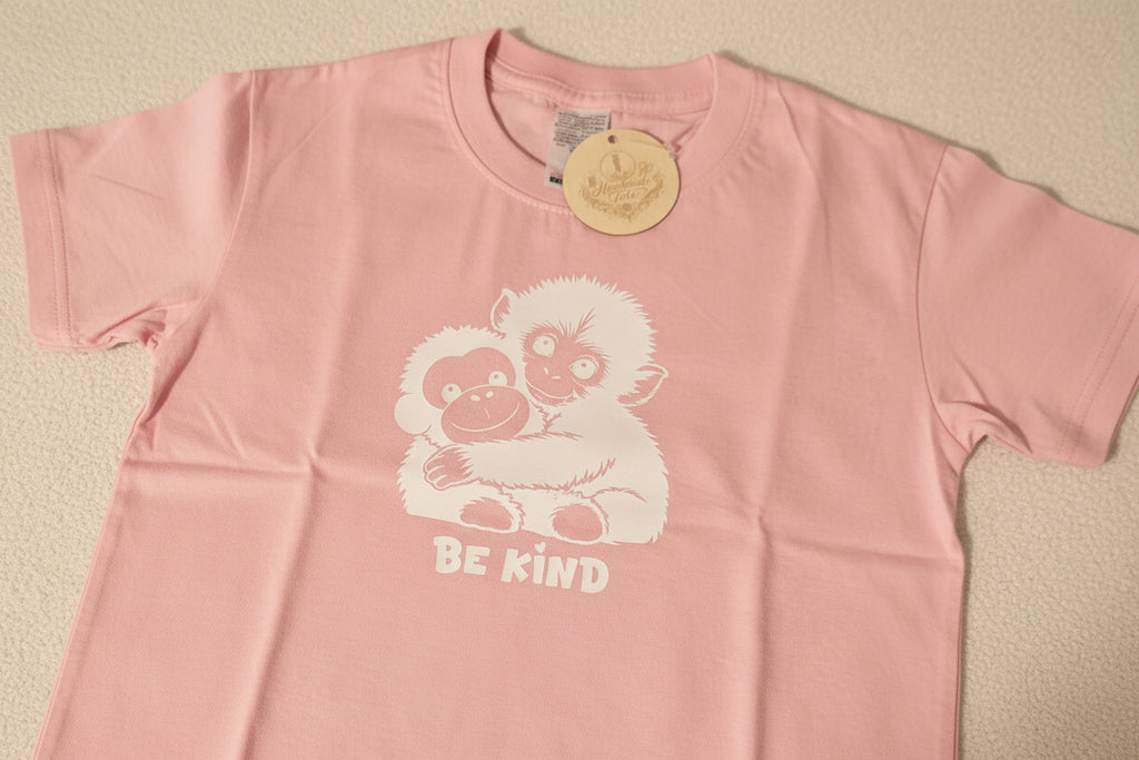 kids short sleeve tshirt with punch the monkey design in white htv with be kind logo