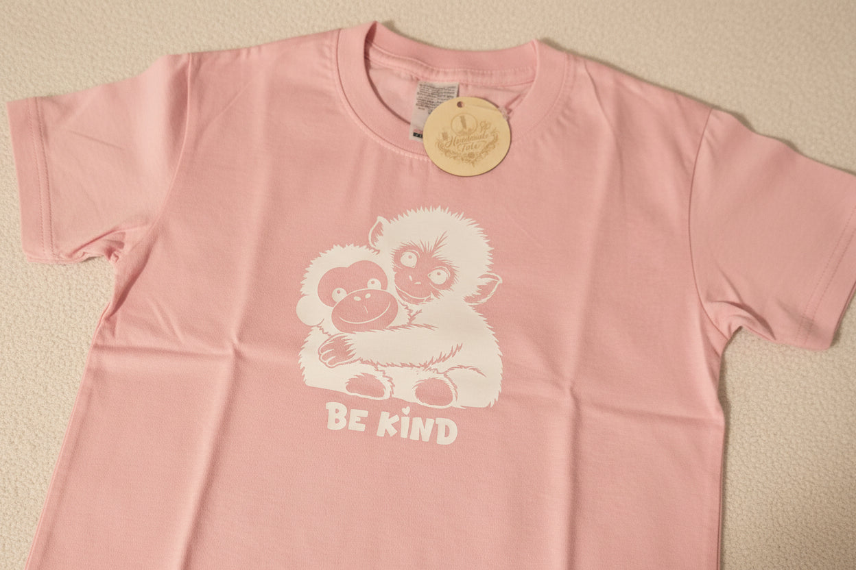 kids short sleeve tshirt with punch the monkey design in white htv with be kind logo